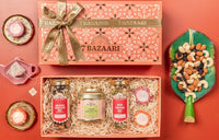 7 Bazaari Fit & Fabulous Gift Hamper | 2 Snack Mixes, Turmeric Lemongrass Tea & 2 Diyas