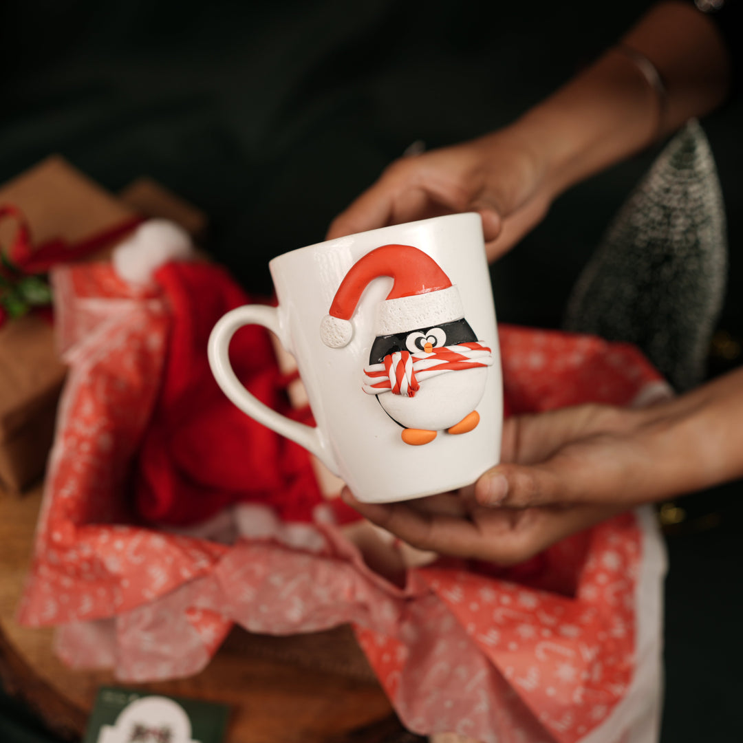 Santa Merry Magic Set – Christmas Gift Hamper with Penguin Mug, Santa Cap, Candles & Tealight House | Premium Festive Gift Box India