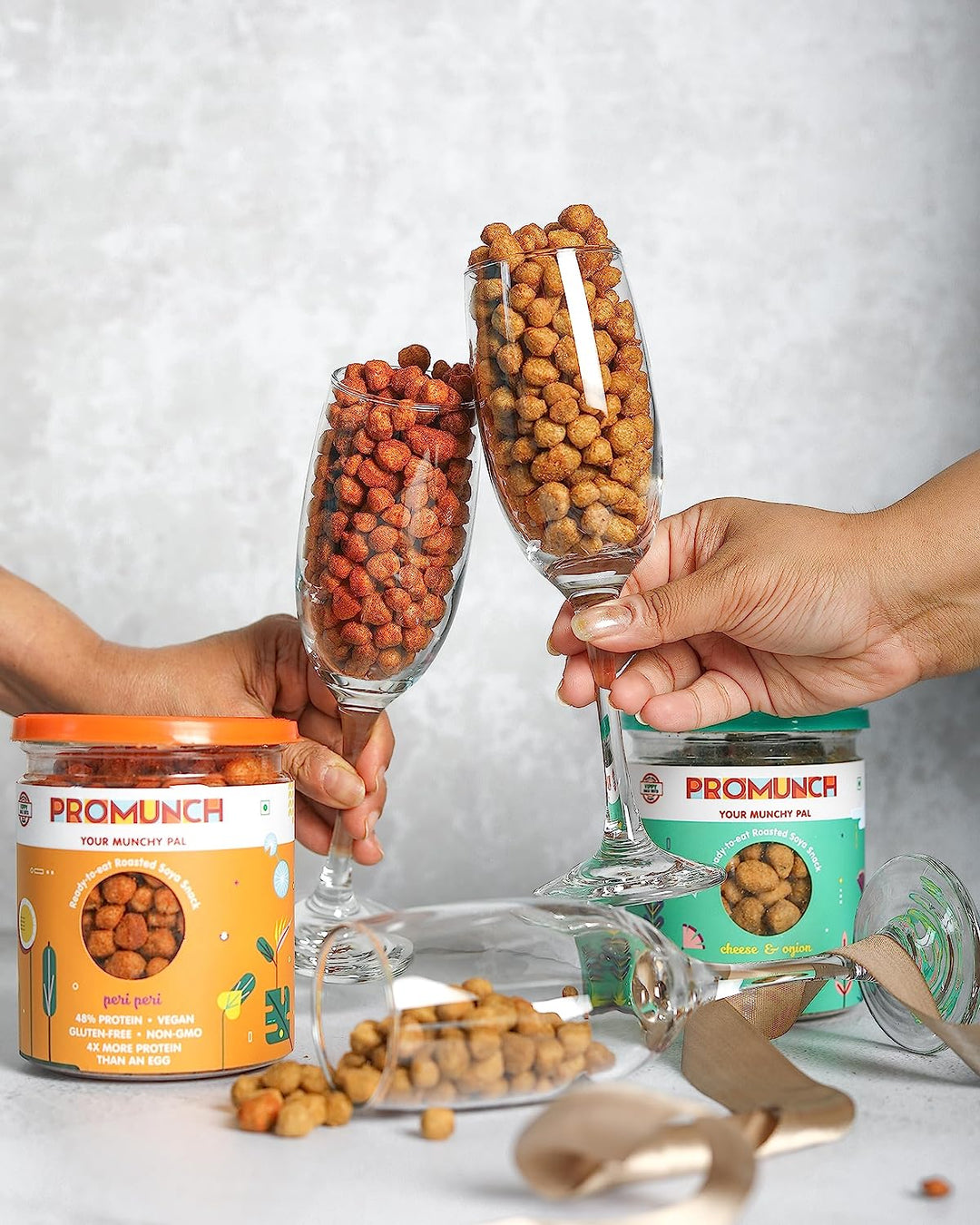 Glasses filled with PROMUNCH soya snacks, capturing a fun and enjoyable snack time moment.