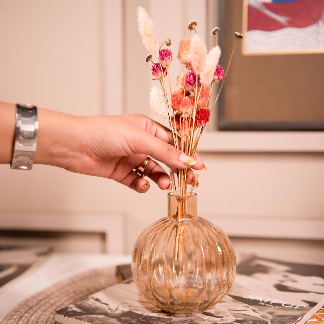 Pumpkin vase with dried flower bunch - https://artecasa.in/