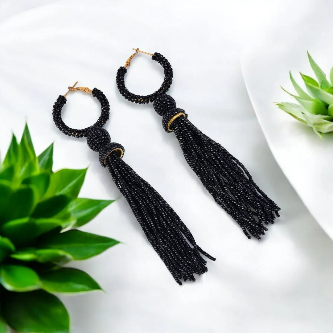 Elegant Black Beaded Hoop Earrings with Tassel Detail