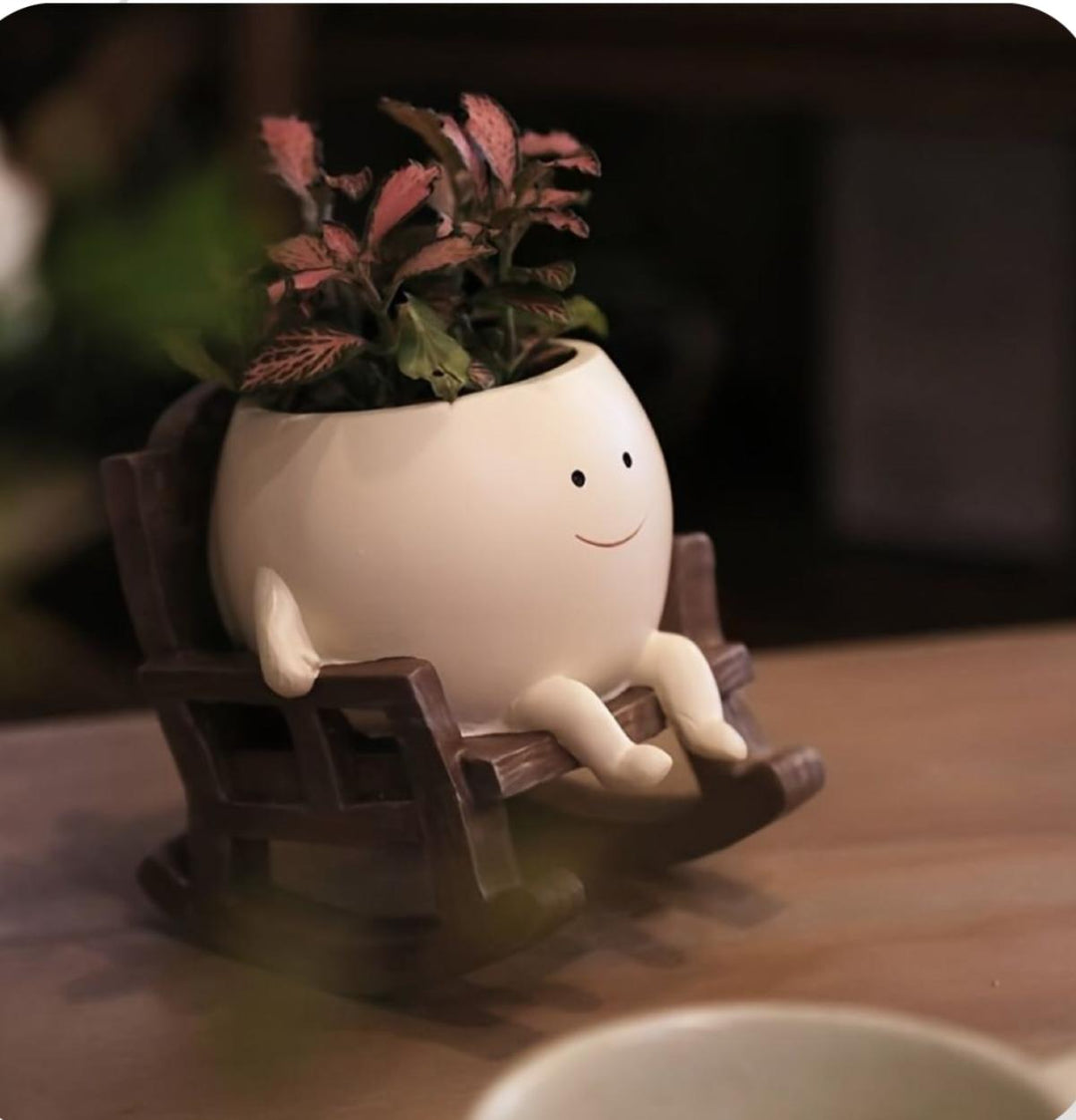 Swing planter on chair - https://artecasa.in/