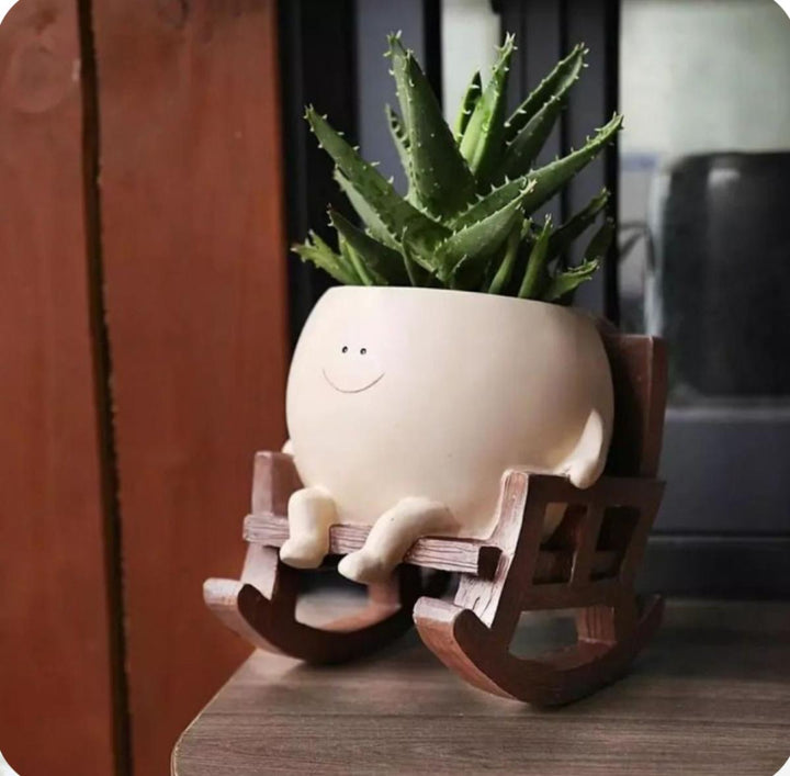 Swing planter on chair - https://artecasa.in/