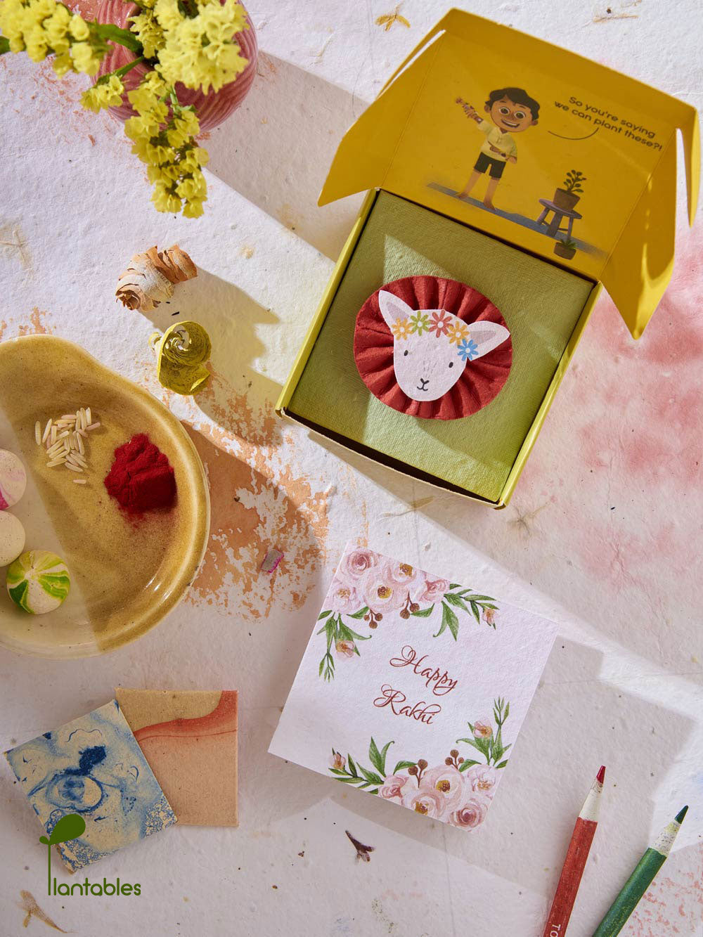 Plantables Lamb with a Floral Headgear Rakhi Combo