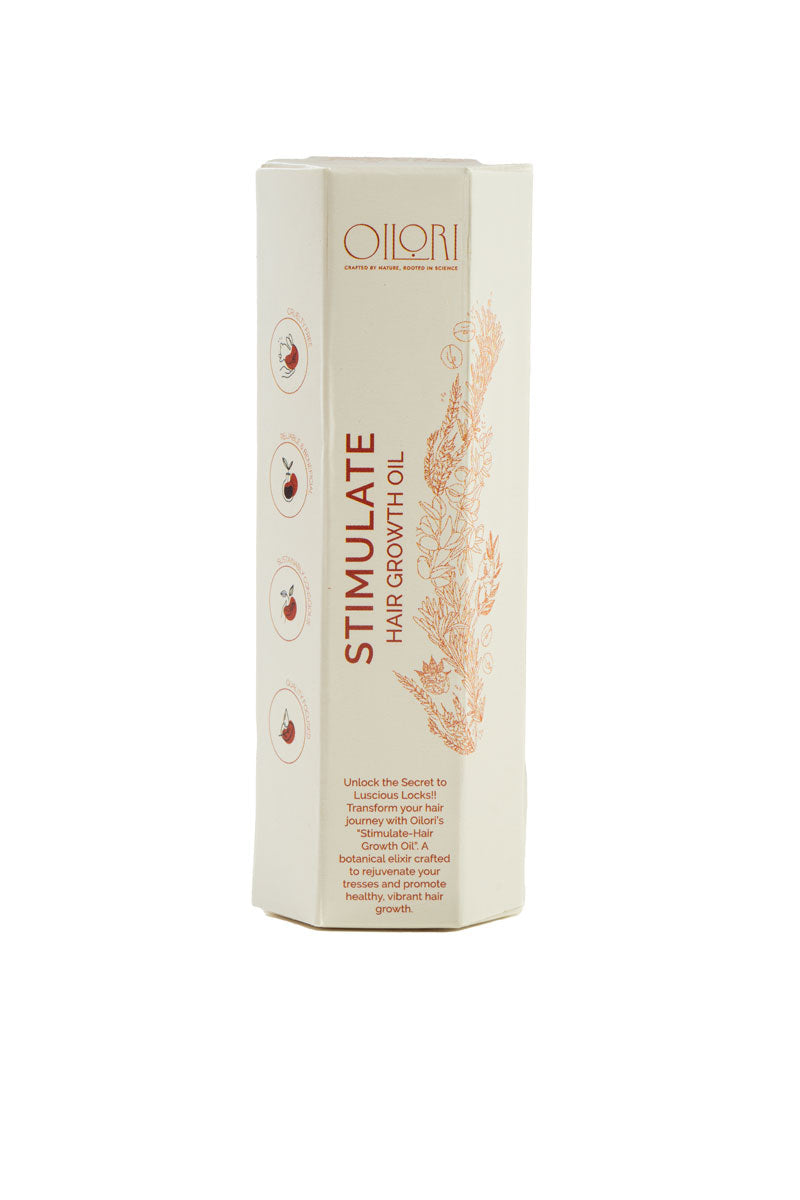 Close-up of Oilori Stimulate Hair Growth Oil showing rich golden texture and plant-based formulation.
