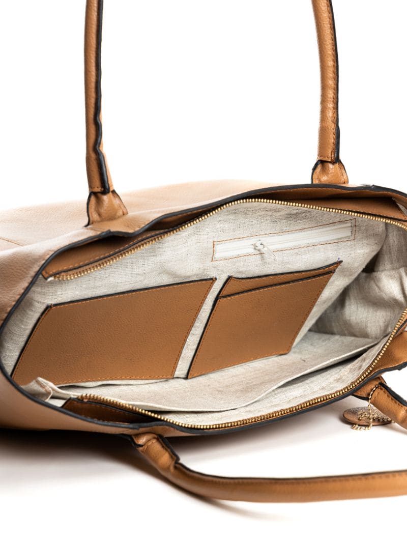 Athena caramel plant-based leather tote bag interior showing compartments, zip pocket and structured lining