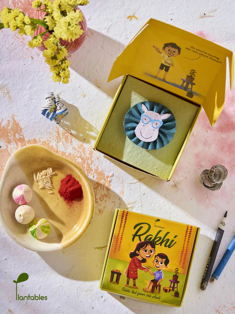 Plantables Cow with Cat-Eyed Spectacles Rakhi