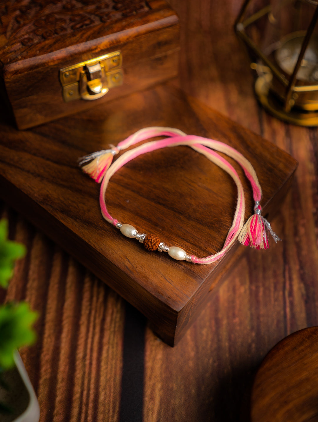 Diamond By Tilesh 925 Silver Rudraksha & Pearl Rakhi on Blush Pink Thread