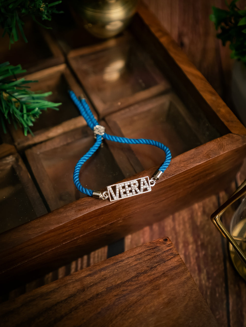 Diamond By Tilesh Silver Custom Name Rakhi – "VEERA"