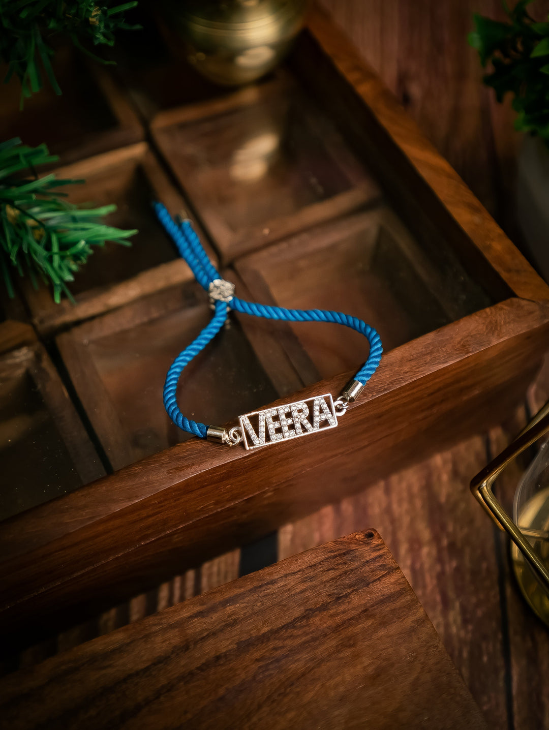 Diamond By Tilesh Silver Custom Name Rakhi – "VEERA"