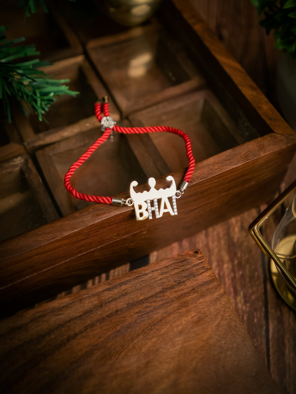 Diamond By Tilesh Sterling Silver Bhai Rakhi – Fun Brother Charm with Bold Red Thread