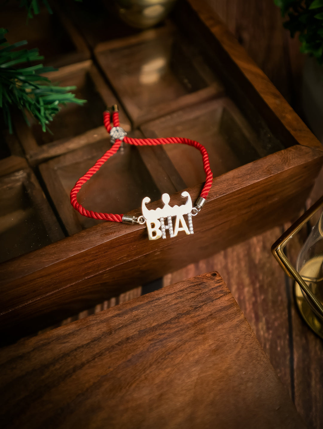 Diamond By Tilesh Sterling Silver Bhai Rakhi – Fun Brother Charm with Bold Red Thread