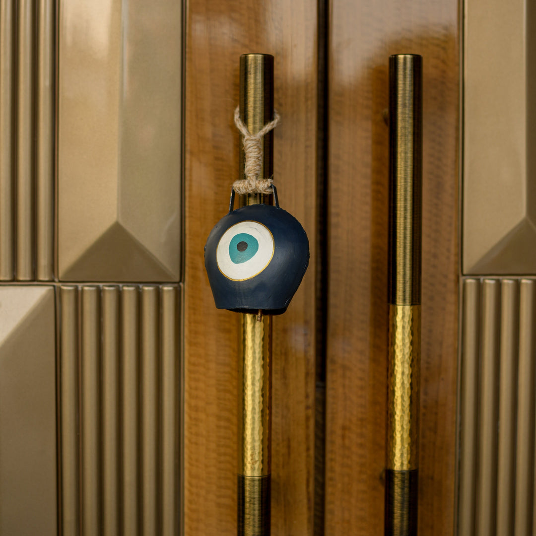 Evil Eye Cowbell Hanging | Handcrafted and Sustainable | Protective Wall & Door Hanging with Soothing Sound - Suspire