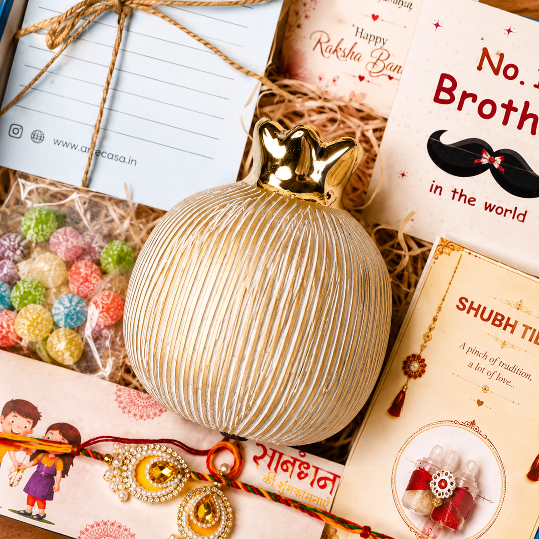 Artecasa Ivory Pomegranate Rakhi Gift Hamper for Bhai Bhabhi