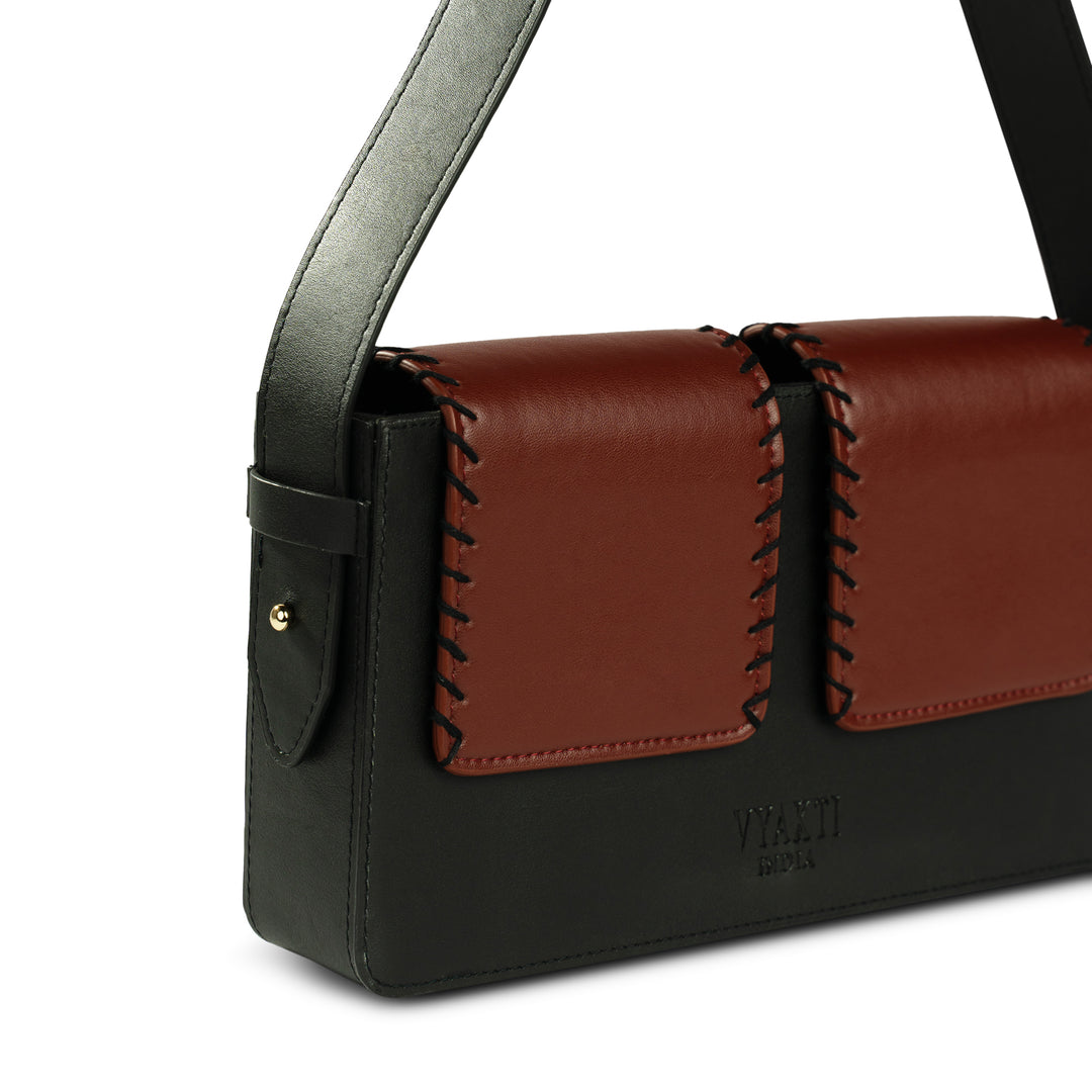 Double flap shoulder bag