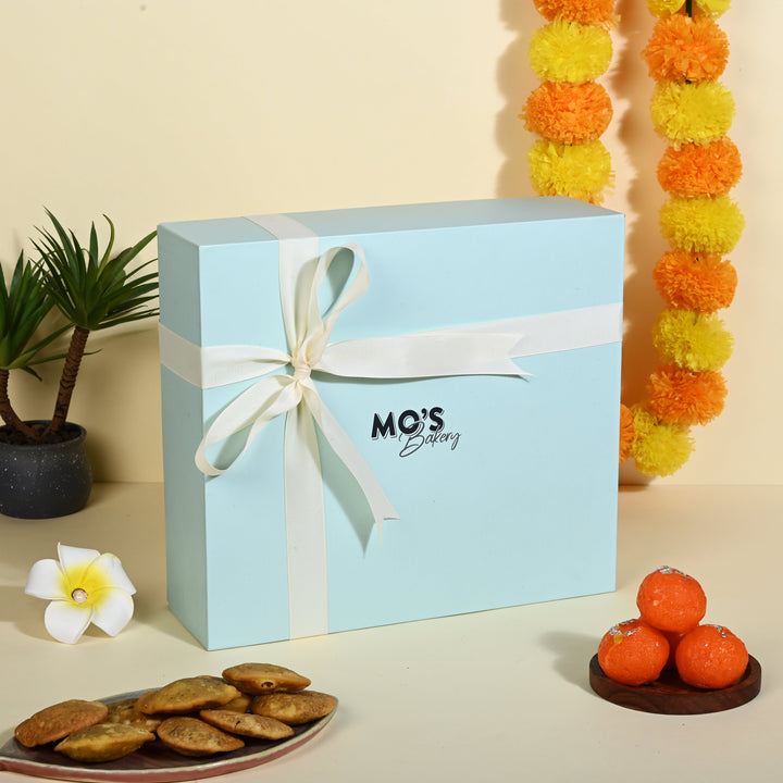 Mo's Bakery Mo’s Blue Gift Box Raspberry & apple cinnemon Cookies – 2 Cookies, 4 Diyas, 2 Coasters, Roli Tikka Chawal Set & Potli Pouches - Suspire