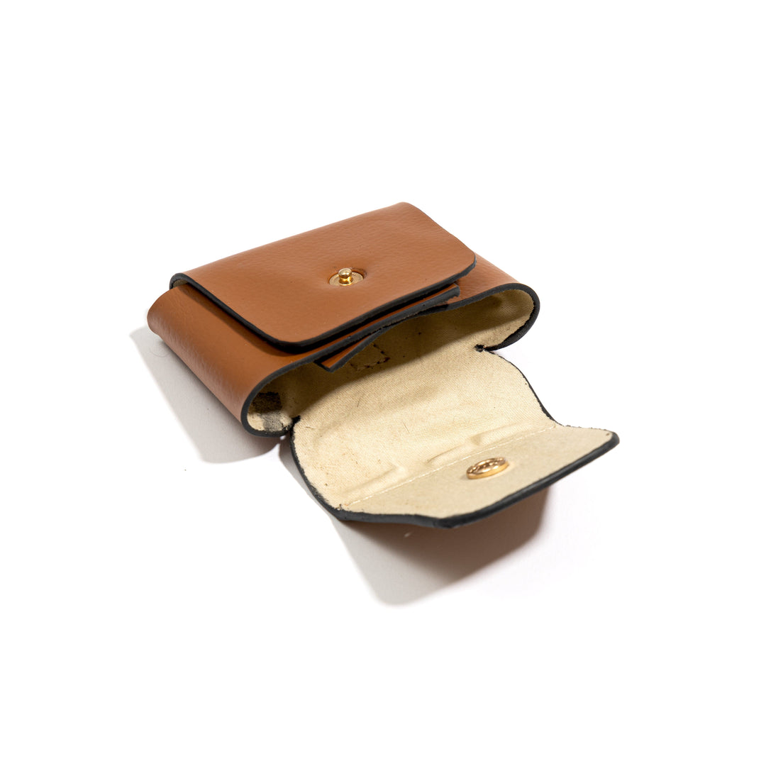 Open plant leather AirPods cover with hemp lining from the Work-On-The-Go gift set – Tan | Green Hermitage