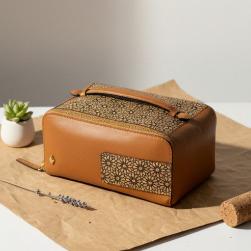 Plant leather travel utility kit in tan matt with cork detailing and handle by Green Hermitage.