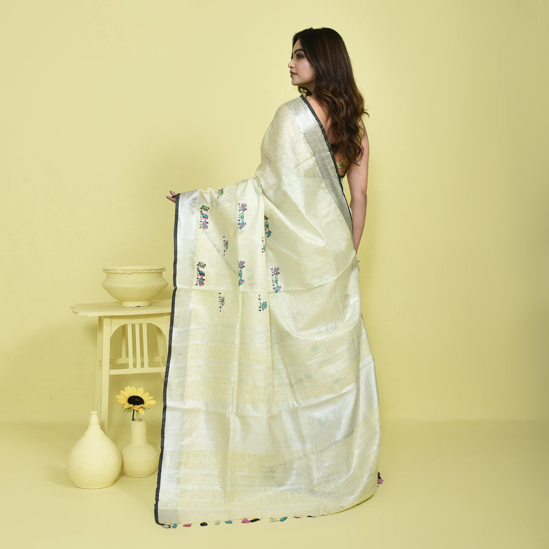 Stotra Cream Pure Linen Saree with Bird Embroidery and Silver Zari Border