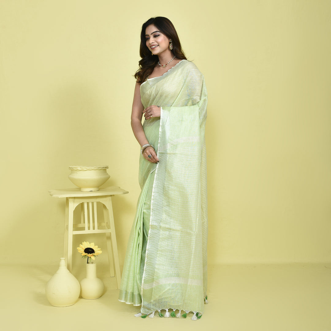 Stotra Light Green Pure Linen Saree with Silver Zari Border
