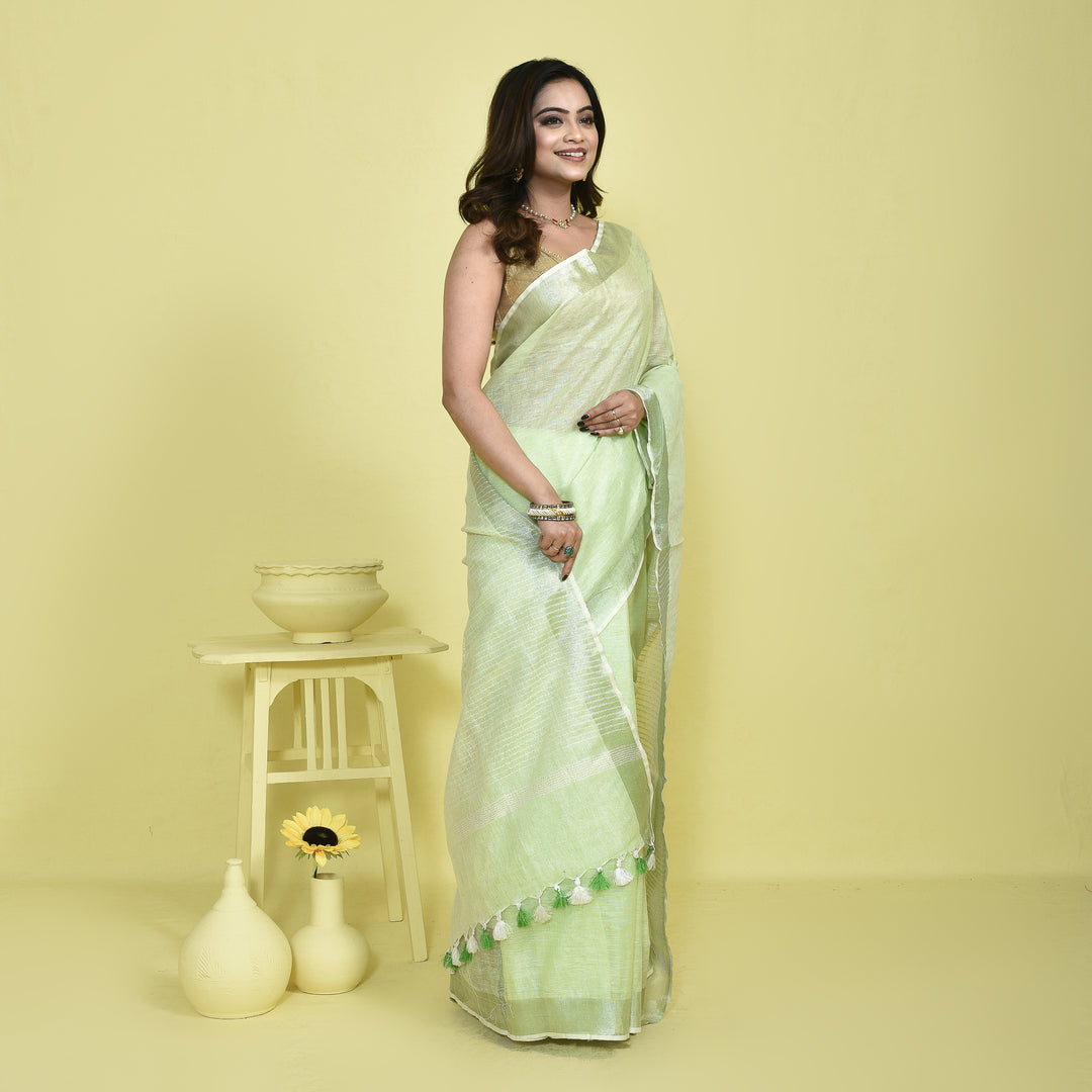 Stotra Light Green Pure Linen Saree with Silver Zari Border