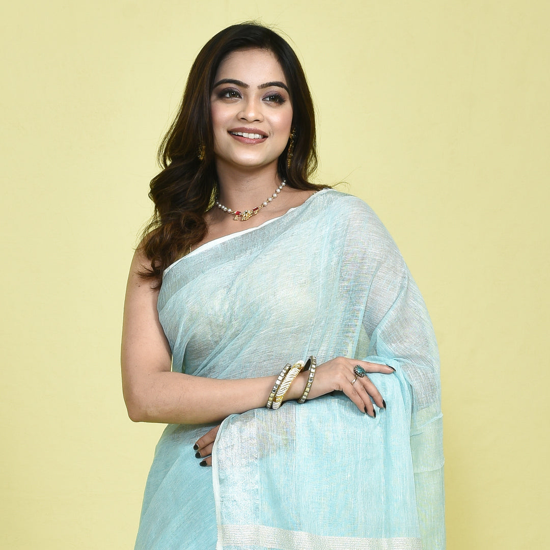Stotra Sky Blue Pure Linen Saree with Silver Zari Border