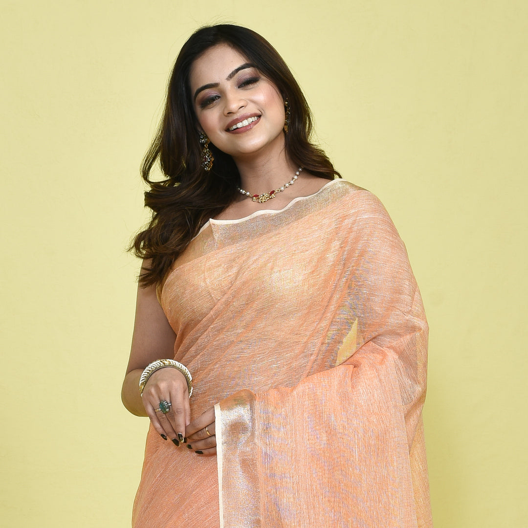 Stotra Peach Pure Linen Saree with Metallic Zari Border