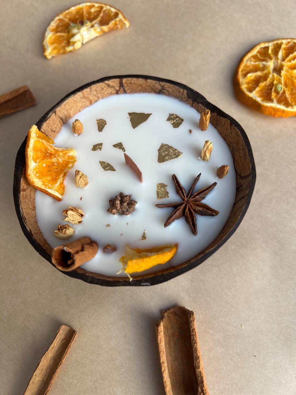 The Lushlights Christams spices coconut shell candle