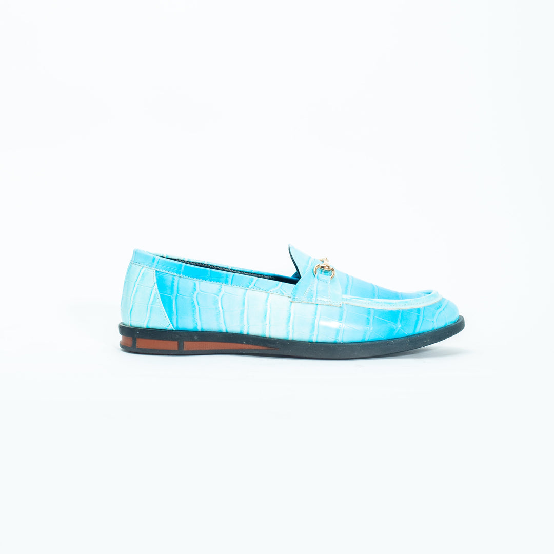 A pair of vibrant Monkstory brand Flatform Horsebit Slip Ons in powder blue crocodile skin, perfect for formal occasions.