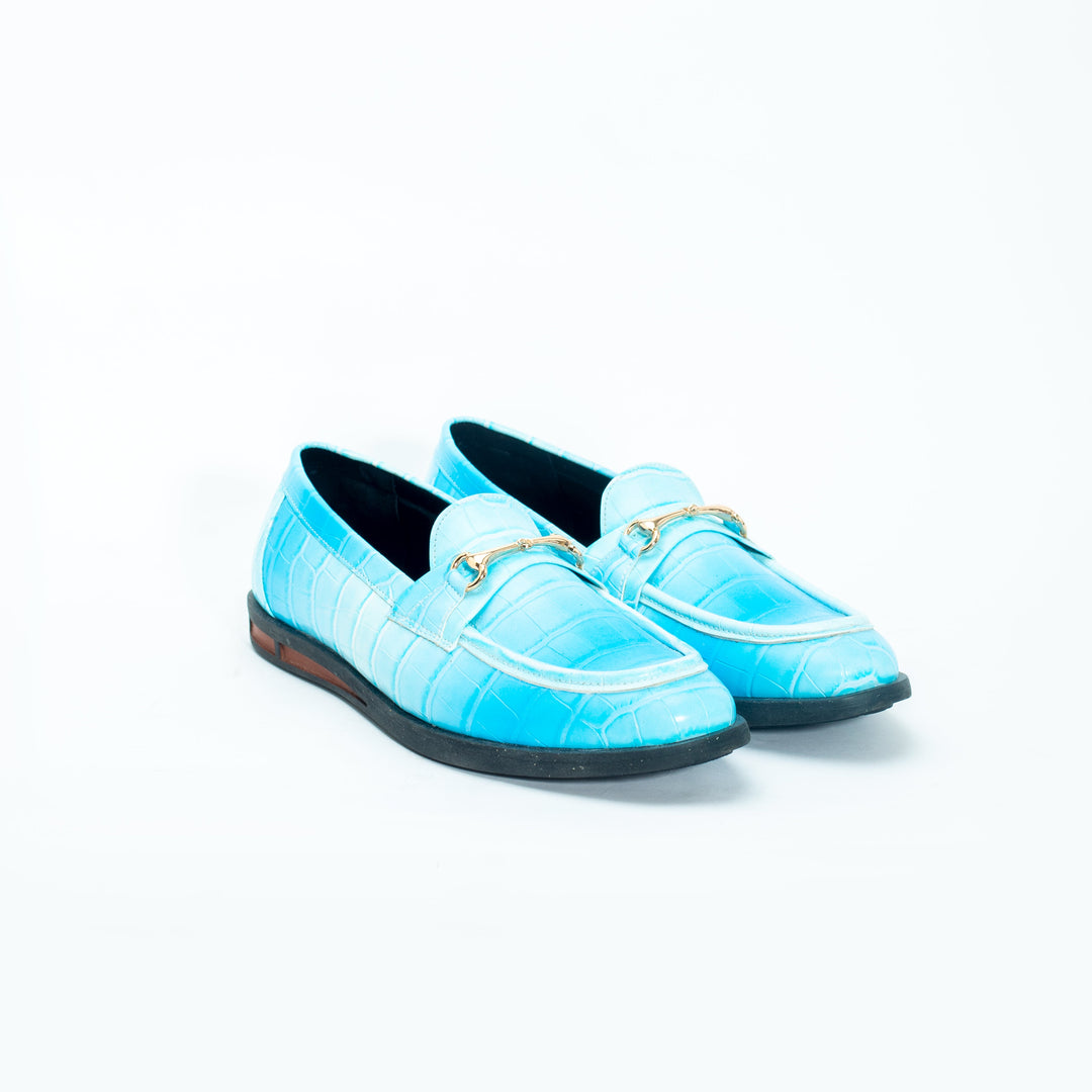 A pair of vibrant Monkstory brand Flatform Horsebit Slip Ons in powder blue crocodile skin, perfect for formal occasions.